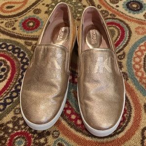 Rose gold Michael Kora slip on tennis shoes